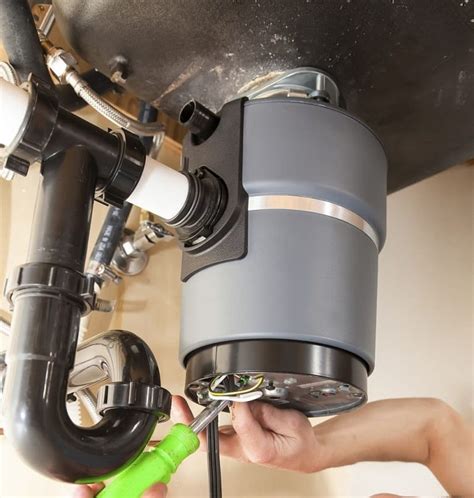 what makes a garbage disposal leak from the bottom|Garbage Disposal Leaking from Bottom: Quick Fix Solutions!